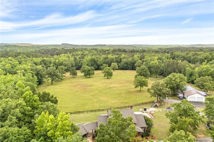 Vast green meadows and lush woodlands create an idyllic, peaceful landscape for this private estate.