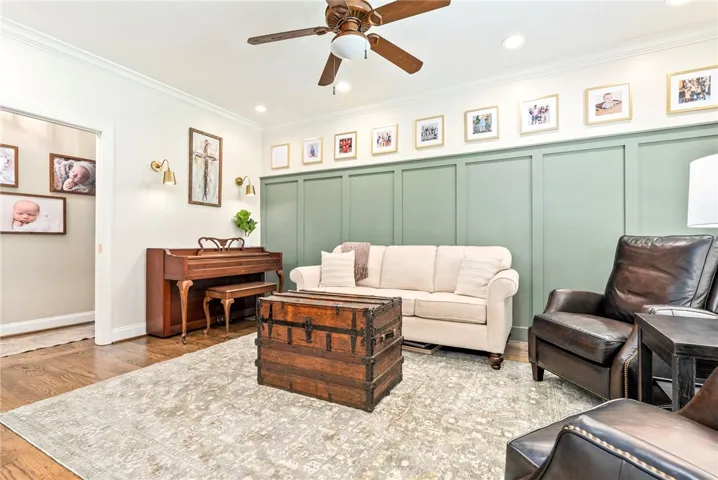 Hardwood floors and a bright, spacious layout define this inviting living room.