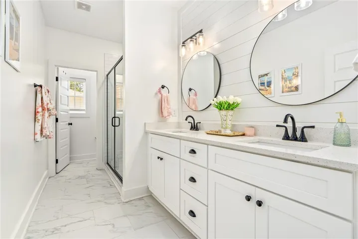 Primary bath with double vanity and walk in shower