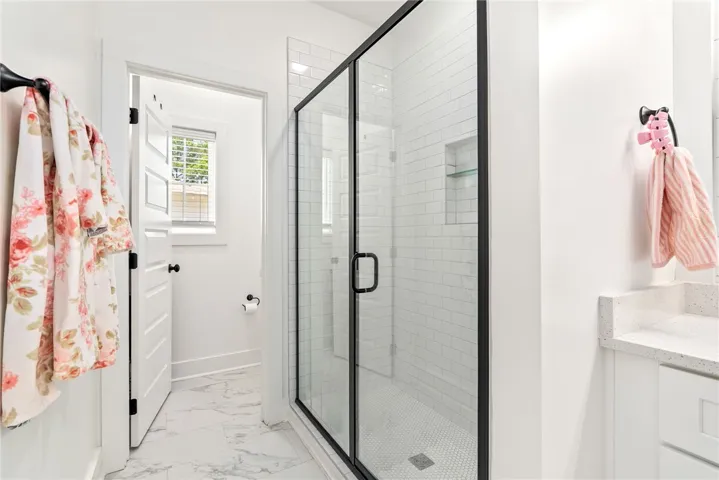 Primary bath with double vanity and walk in shower