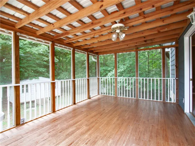 Enjoy early morning quiet time or tranquil evenings on the screened-in porch.
