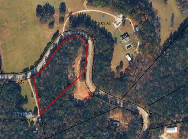 Visualize your future home nestled on this expansive, wooded lot with convenient road access.