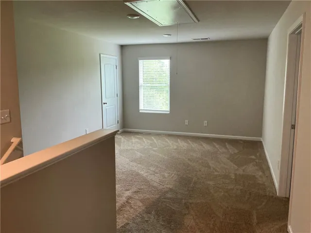 A versatile open loft area provides additional living space.
