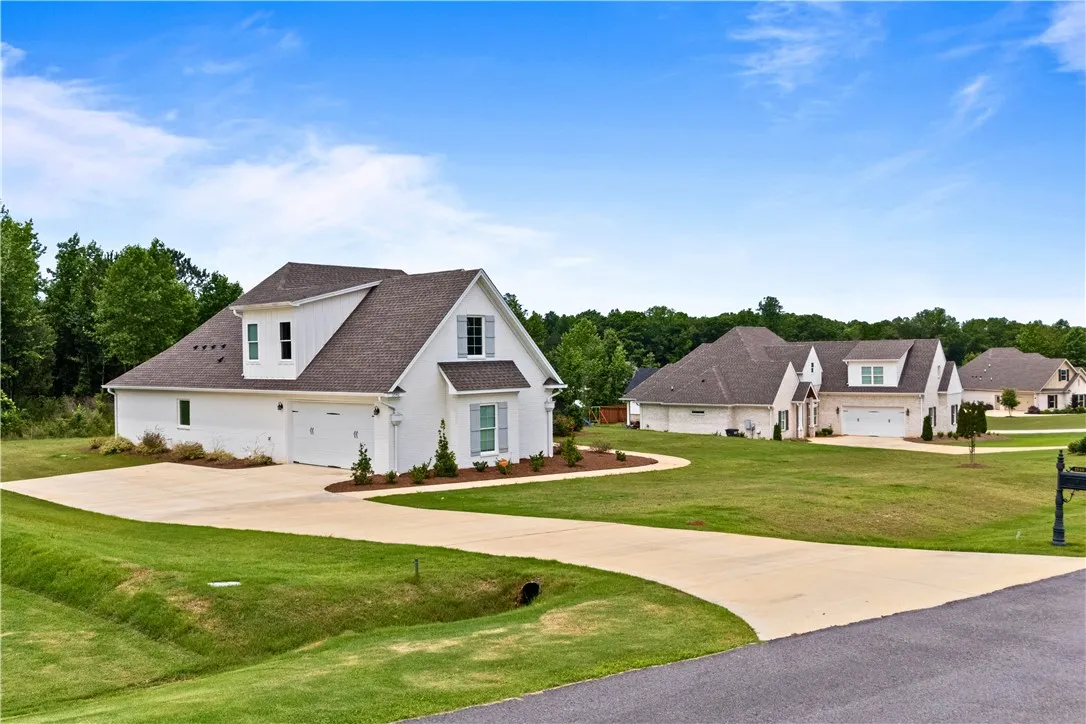 An oversized driveway provides ample space.
