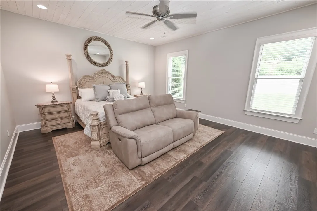Tranquil and private, the main level primary suite is a true retreat!