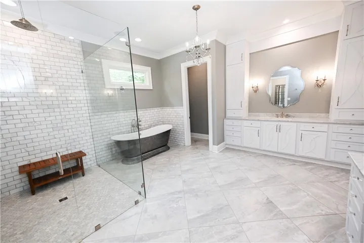 POV: You're chin-deep in bubbles in this magnificent freestanding tub with relaxing music drifting down from the overhead speakers.......