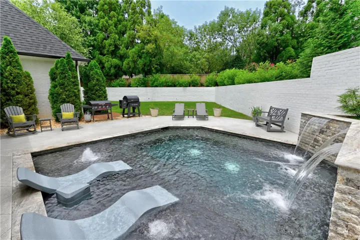 Your very own secret garden, tucked away behind stately brick garden walls.