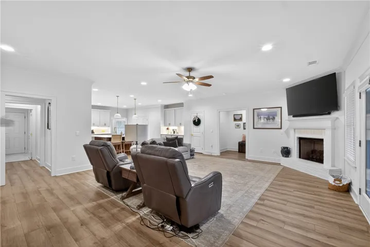 An open floorplan seamlessly connects the living room to the kitchen, promoting a natural flow for daily living.