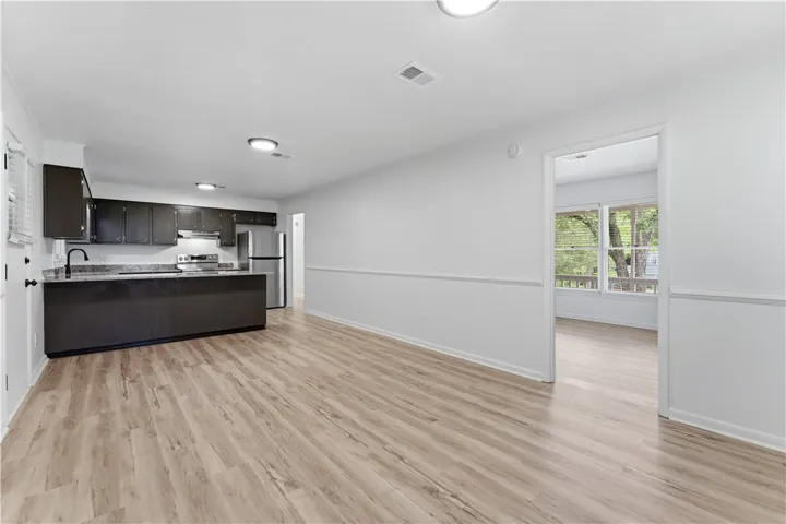 Kitchen opens to family area, great for entertaining.