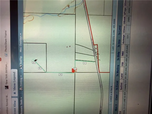 Property plat map with boundary lines and key identifying features for a clear overview.