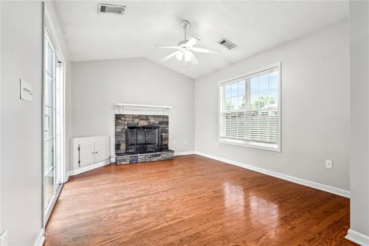 2nd living room opens to the kitchen and has a glass door to the backyard.