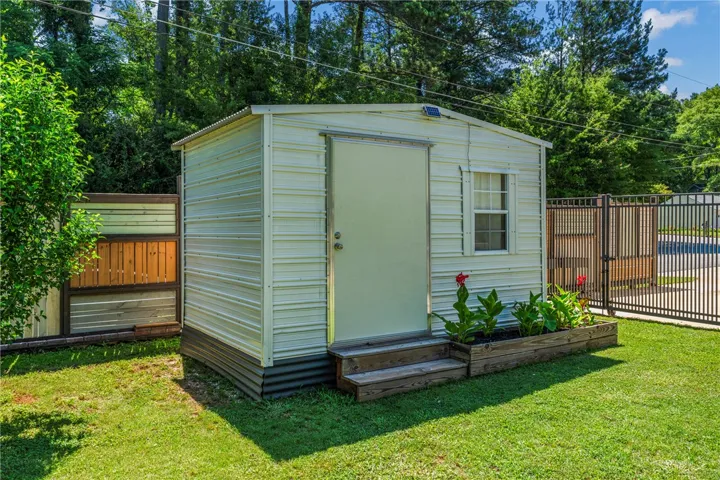 A well-maintained storage shed offers practical utility.