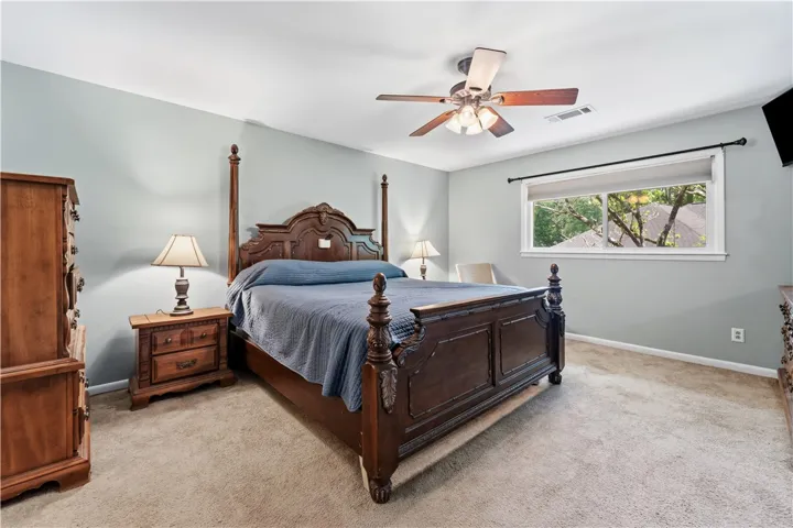 A comfortable bedroom with a warm, inviting ambiance, ideal for restful nights.