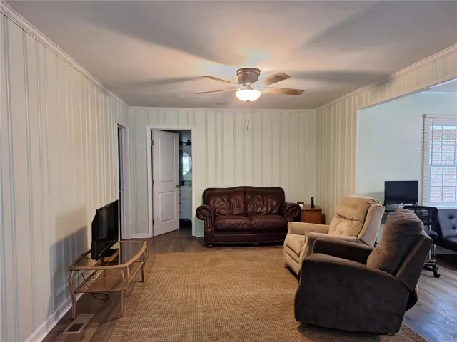 A relaxed living area with ample seating and a bright, inviting atmosphere.