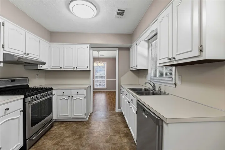 A well-equipped kitchen provides essential appliances for daily meal preparation and effortless cleanup.
