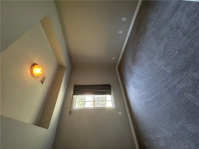 A well-lit interior space with a window offering views of the outdoors.