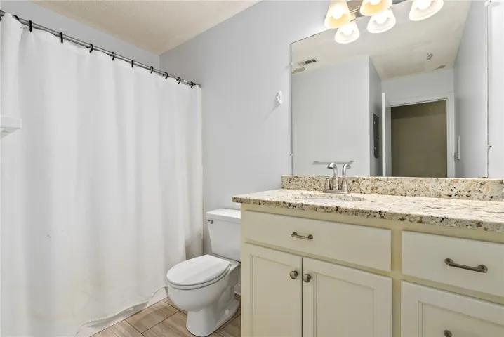 Clean lines and a functional design define this well-appointed bathroom space.