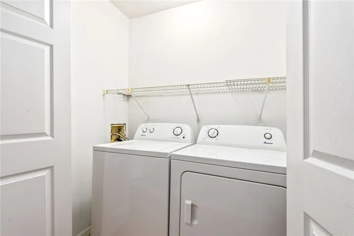 A dedicated laundry space provides optimal functionality and easy-care appliances.