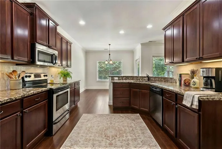 Virtually staged.  *This home does not feature under cabinet lights currently*