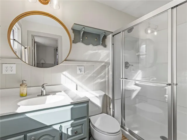 A well-appointed bathroom with a spacious walk-in shower and ample vanity space.