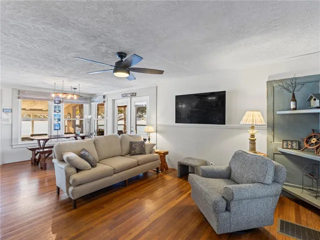 Hardwood floors complement this inviting living space with ample natural light.