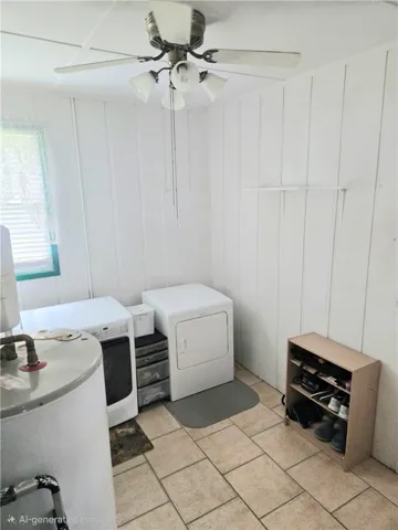 Functional utility room with tiled flooring and convenient laundry appliances.
