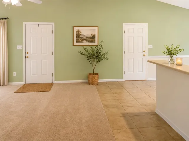 Virtual Staging. The seamless transition between soft carpet and durable tile flooring creates a welcoming, versatile interior space.
