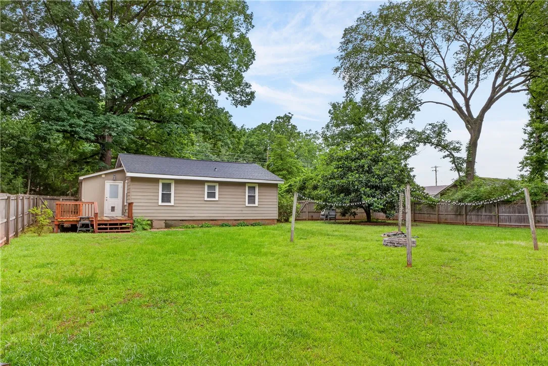 A private backyard oasis awaits, offering ample space for outdoor enjoyment and relaxation.