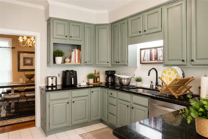 A well-appointed kitchen showcasing stylish cabinetry and ample counter space.