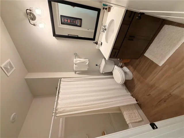 The hall bath offers clean lines and a functional design that defines this well-appointed bathroom.