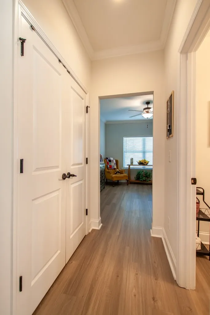 Note the crown molding in the entry hall.  The floors are attractive.