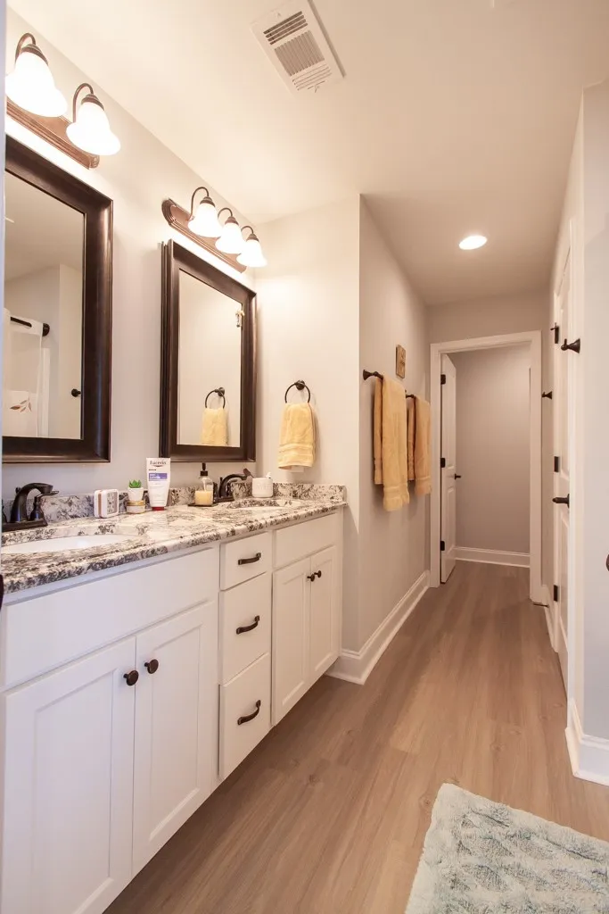 The primary bath offers double vanities and space to share.