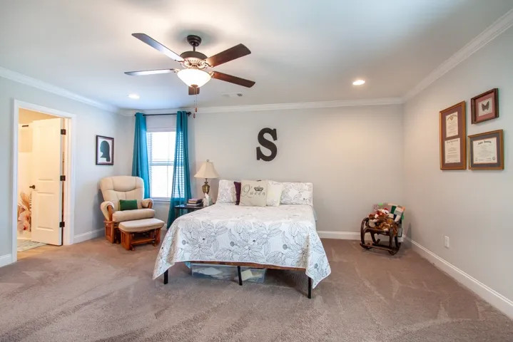 The primary bedroom has plenty of room for more furniture.