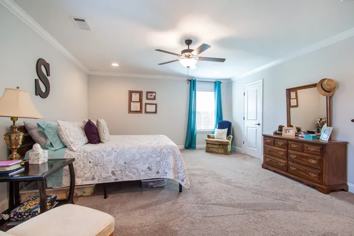 Another view of the primary bedroom.