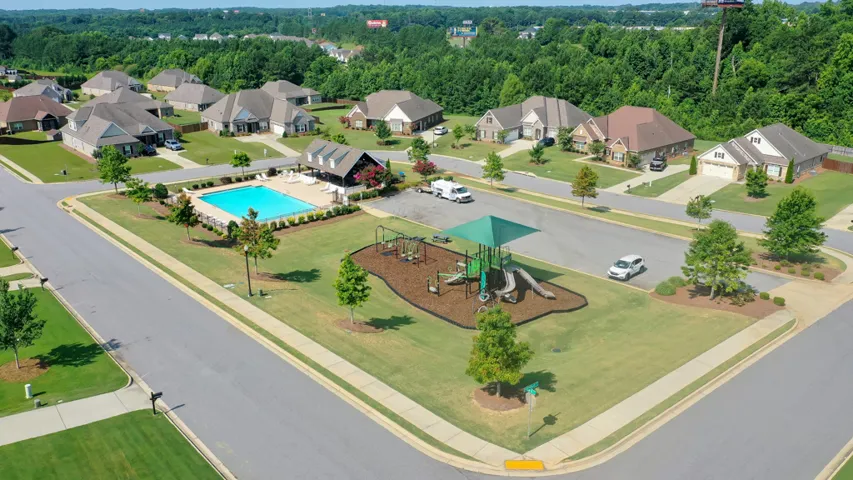 The neighborhood playground has plenty to entertain the kiddos.