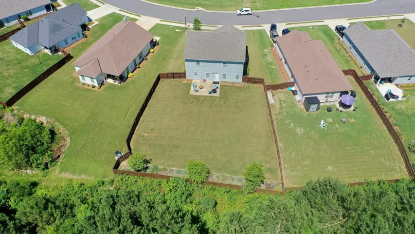 A great thing about owning a house on a curve is that it creates more space between the homes.