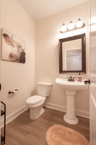 The 1/2 bath is convenient for guests.