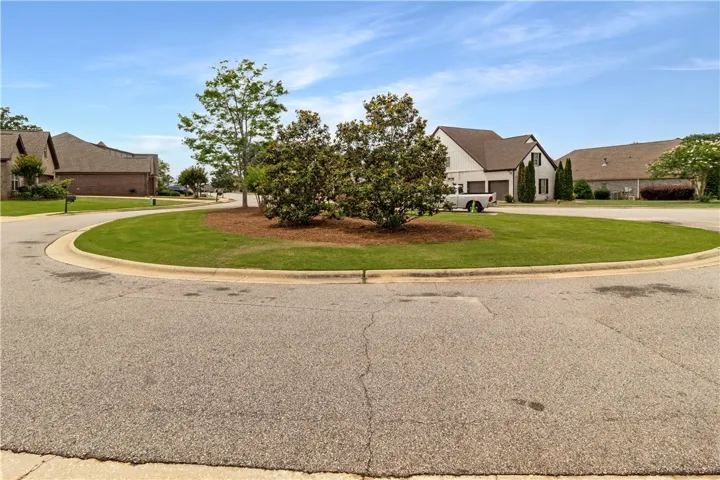 Well-maintained curb appeal with mature landscaping offers a pleasant neighborhood setting.