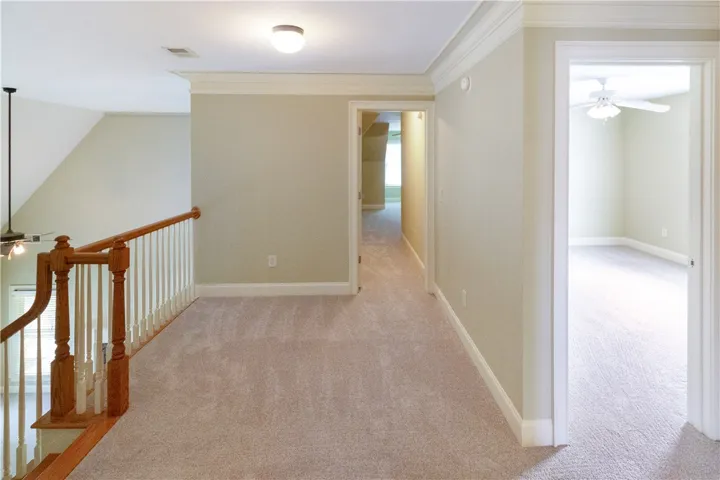 A welcoming upper-level landing, perfect for accessing the home's additional rooms.
