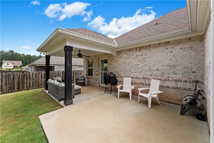 A spacious brick patio provides ample room for outdoor enjoyment and relaxation.