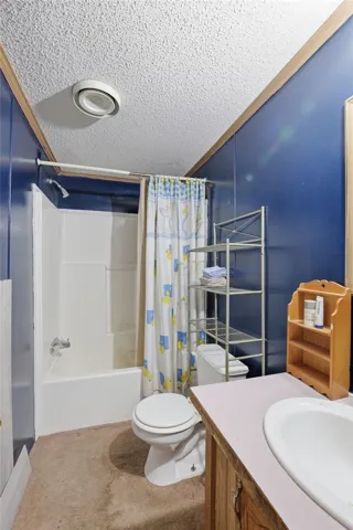 Functional full bathroom with shower and vanity offers everyday convenience.