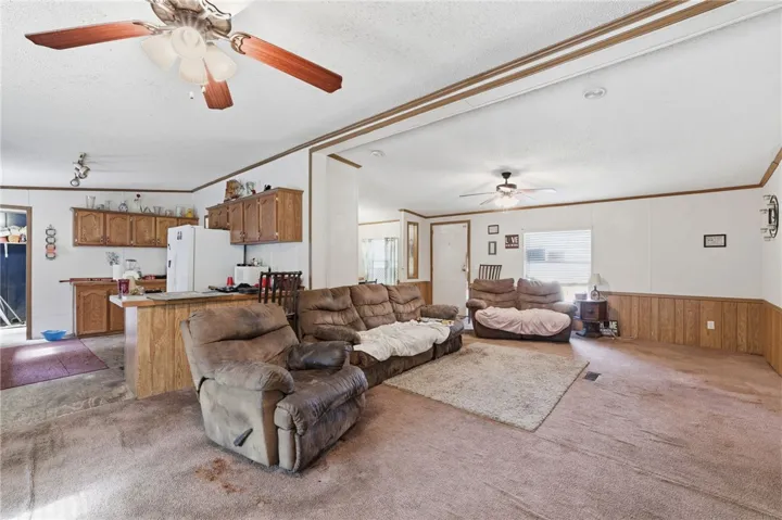 An open-concept living area seamlessly connects to the kitchen, ideal for relaxed gatherings.