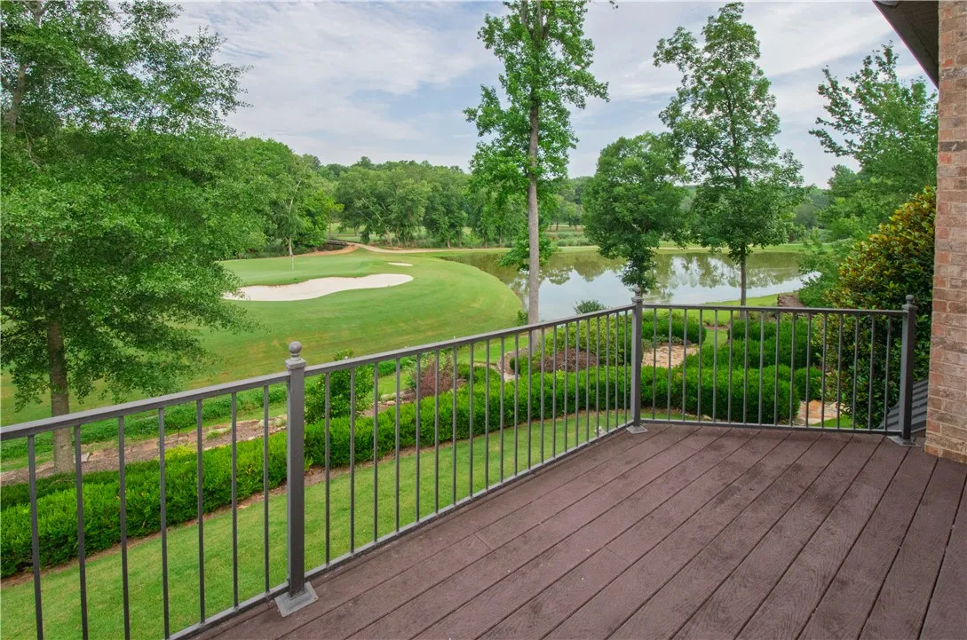 Unwind on this spacious deck, overlooking a serene golf course and tranquil lake.