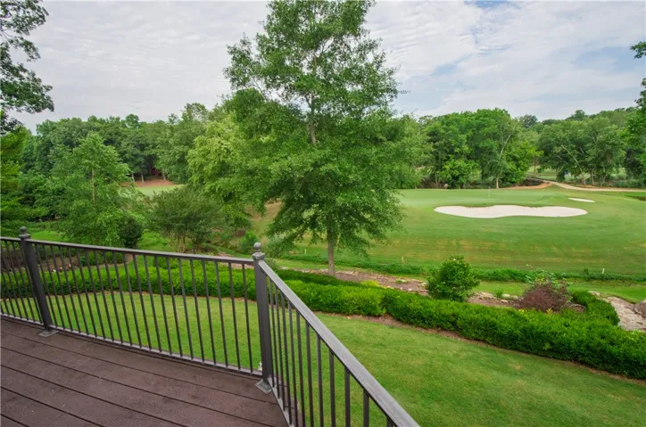 Unwind on the deck with scenic views overlooking the meticulously maintained golf course.