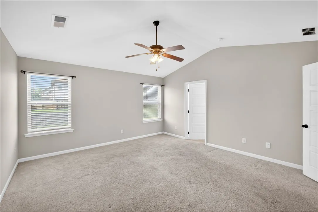 A quiet retreat with vaulted ceilings and soft carpet.