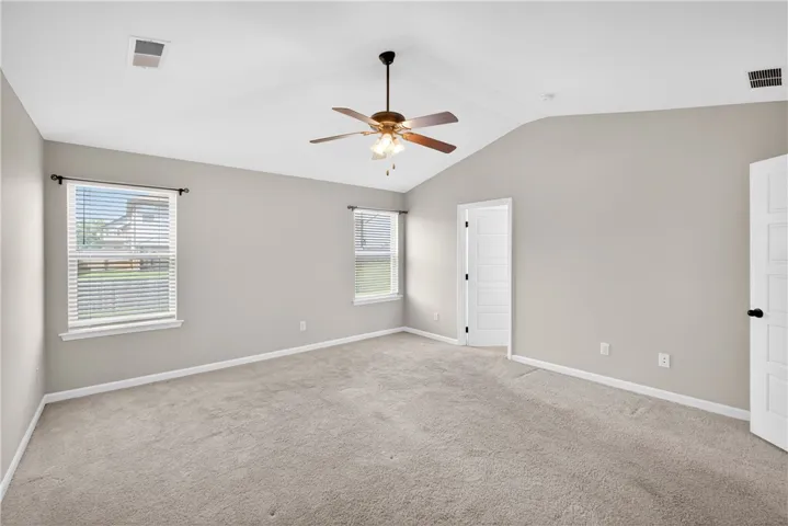 A quiet retreat with vaulted ceilings and soft carpet.