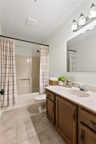 Large vanity w/rich wood work & dark hardware accents