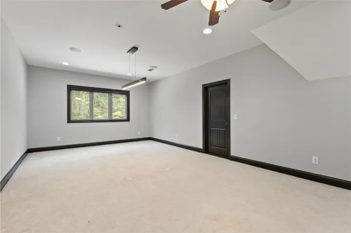 A spacious Bonus room is perfect for a versatile living area, media room, or 5th bedroom.