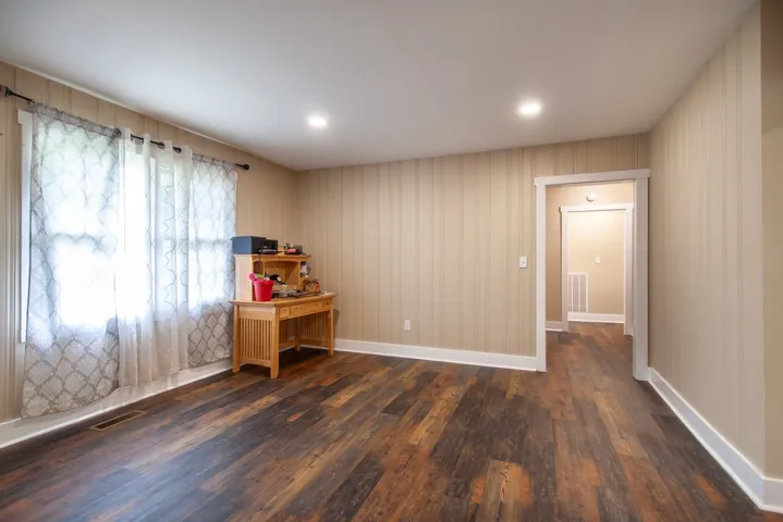 Overflow room makes a great office space or children's play area.