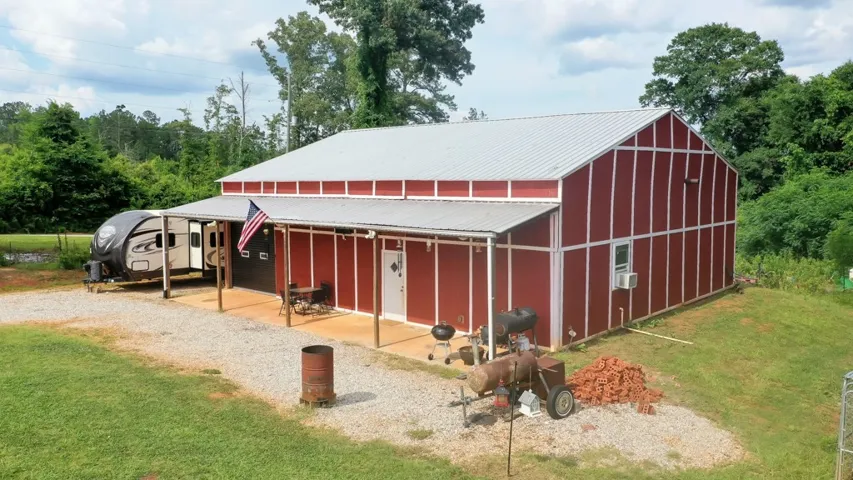 A spacious 40 X 48 barn boasting a full bar/kitchen and bath.
